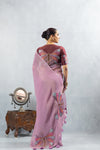 A full back view of the model in the Vanya Sarees ensemble, displaying the butterfly print pallu and the statement appliqué blouse.