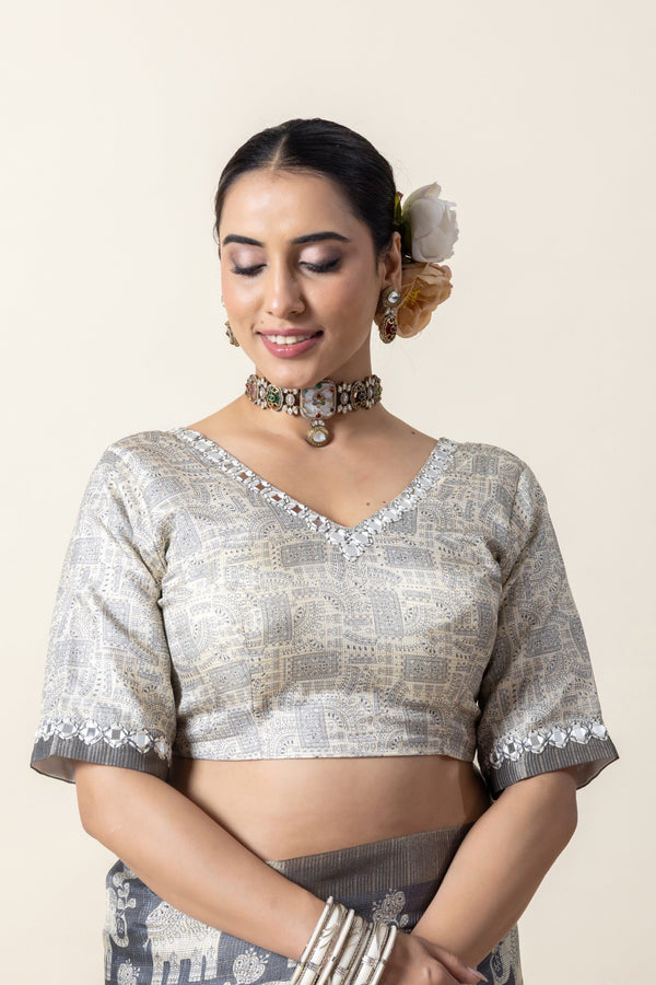A clear front view of the readymade designer blouse from Vanya Sarees, highlighting the V-neck and mirror work detail.