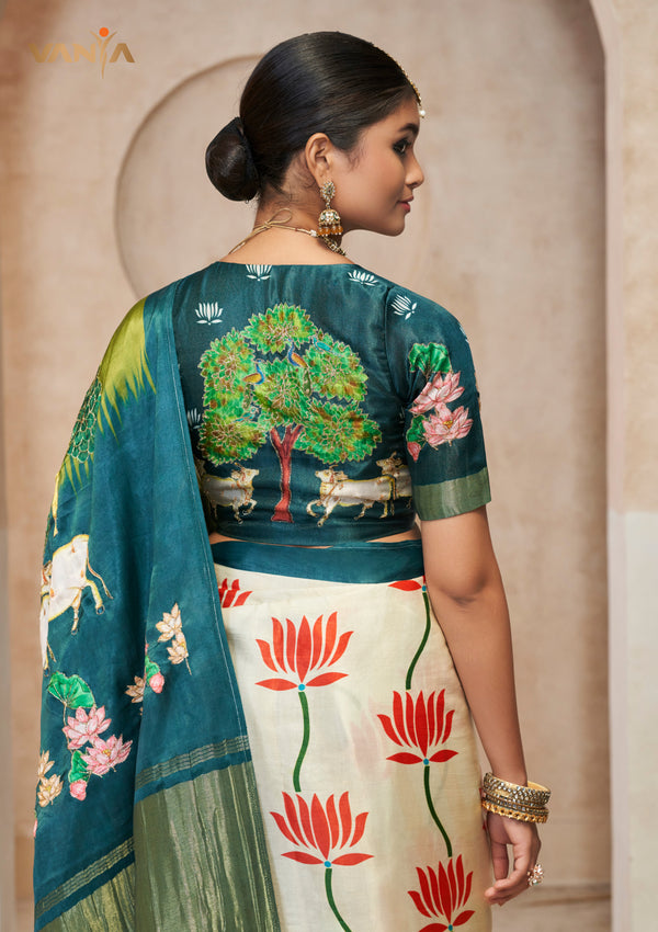 The stunning statement back of the designer blouse from Vanya Sarees, featuring a magnificent Pichwai-style mural of cows under the Tree of Life.