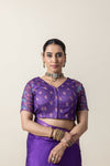 A clear front view of the Vanya Sarees readymade designer blouse in purple, showing the V-neck and delicate floral print.