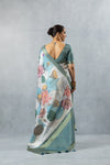 Vanya Linen-Silk saree back view, showing open back blouse and full pallu with abstract lotus print and tassels.
