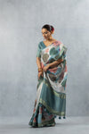 Vanya modern saree draped in a flattering side pose, highlighting the fluidity of the linen-silk blend and the blouse fit.