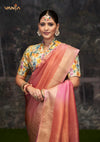 A beautiful close-up of the model in a Vanya Sarees saree, highlighting the unique shirt collar and rich floral print of the designer blouse.