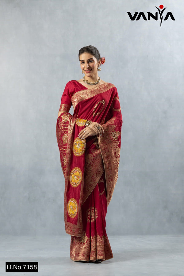 Vanya full-length front view of the Maroon Art Silk Saree (7158) showcasing the heavy gold zari pallu and circular folk buttas.