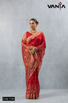 Vanya full-length front view of the Royal Ruby Red Zari brocade saree showcasing the heavy pallu weave.