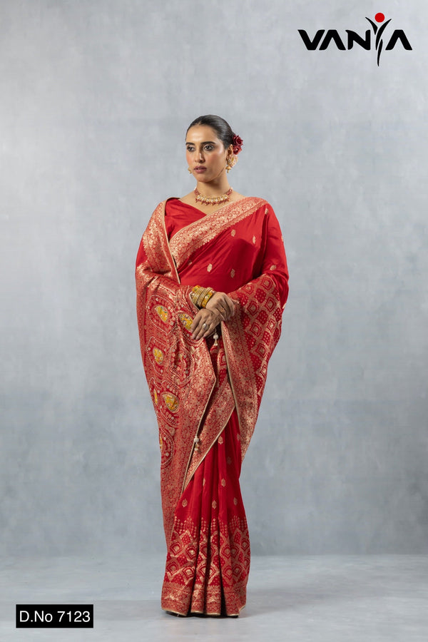 Vanya full-length front view of the Royal Ruby Red Zari brocade saree showcasing the heavy pallu weave.