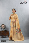 A full-length view of the model in Vanya Sarees' radiant golden yellow Chanderi silk saree with bird embroidery.