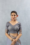 A clear front view of the Vanya Sarees readymade designer blouse in grey Chanderi silk, showing the elegant V-neckline.