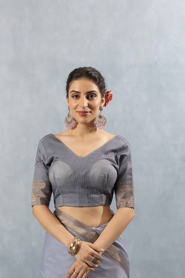A clear front view of the Vanya Sarees readymade designer blouse in grey Chanderi silk, showing the elegant V-neckline.