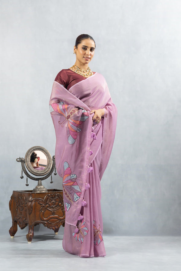 An elegant standing pose of the model in the Vanya Sarees lavender butterfly print saree, perfect for a reception or cocktail party.