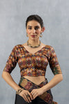 A clear front view of the Vanya Sarees readymade designer blouse, featuring a multi-color geometric Patola-style brocade.