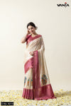 A full-length view of the model in Vanya Sarees' elegant off-white Tussar silk saree with a maroon border and designer blouse.