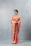 Vanya Peach Saree in a straight front pose, highlighting the overall sophisticated drape and colour.