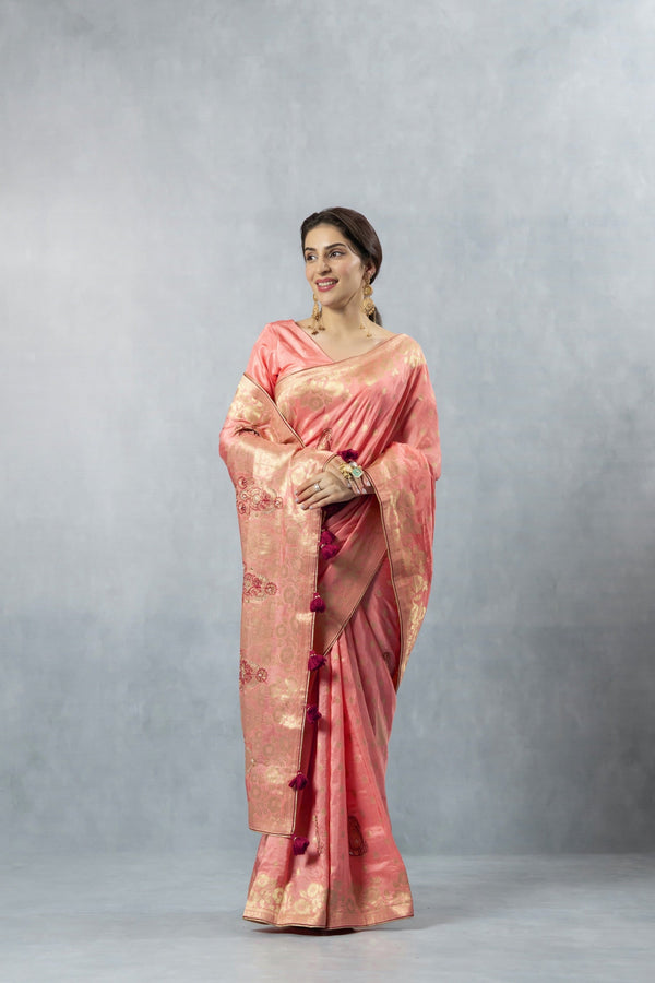 Vanya Peach Saree in a straight front pose, highlighting the overall sophisticated drape and colour.