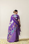 A full back view of the model in the Vanya Sarees ensemble, displaying the grand Pichwai print on the pallu and the statement blouse.