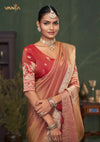 A beautiful close-up of the model in a Vanya Sarees saree, highlighting the heavy embroidered sleeve of the red designer blouse.