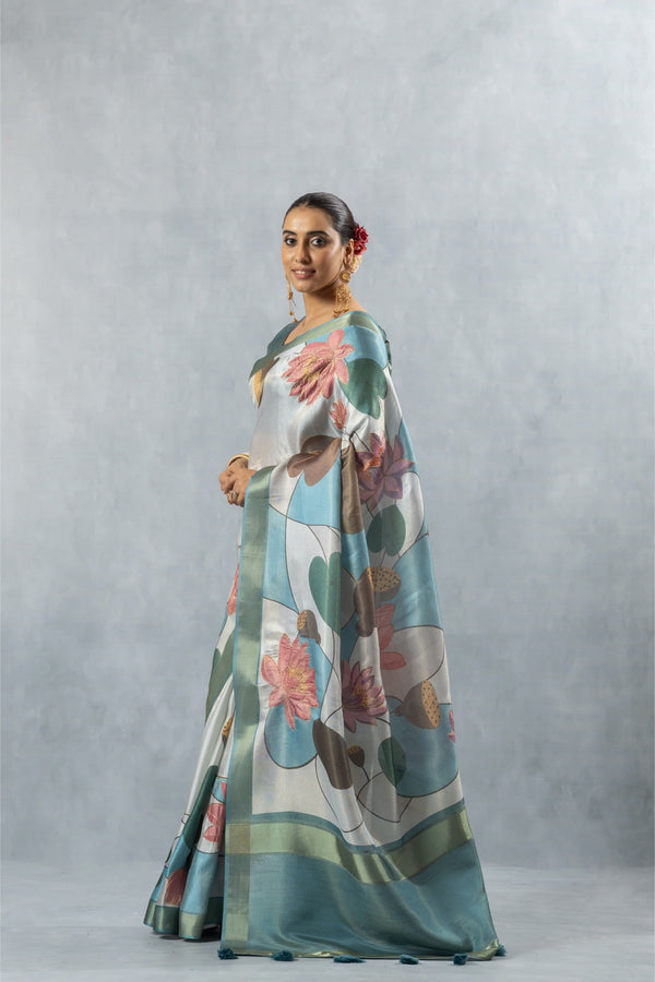 Vanya saree profile view, showcasing the elegant fall and movement of the pallu with the digital print and contrast border.