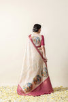 A full back view of the model in the Vanya Sarees ensemble, displaying the parrot print medallions on the pallu and the statement blouse.