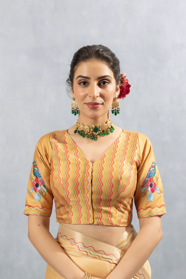 A clear front view of the Vanya Sarees readymade designer blouse, showing the wavy printed front and embroidered sleeves.