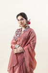 Vanya Front view of the designer floral print shirt-style blouse with puff sleeves, paired with the dusty rose saree.