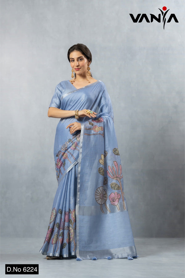 A full-length view of the model in Vanya Sarees' artistic periwinkle blue linen silk saree with a modern floral print.