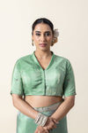 A clear front view of the Vanya Sarees readymade designer blouse, showing the modern collared V-neckline in pista green.
