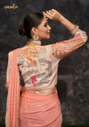 The stunning statement back of the designer blouse from Vanya Sarees, showcasing the intricate, multi-color hand-embroidered mural.