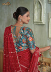 The stunning back view of the Vanya Sarees designer blouse, showcasing the rich multi-color Kalamkari-style print and dori tie-up.