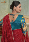 The stunning back view of the Vanya Sarees designer blouse, showcasing the rich multi-color Kalamkari-style print and dori tie-up.