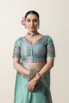 A clear front view of the Vanya Sarees readymade designer blouse, showing the V-neck and delicate butti print.