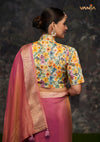 The stunning back view of the Vanya Sarees designer blouse, showcasing the rich multi-color floral print and modern shirt collar.
