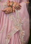 A detailed close-up of the Vanya Sarees saree, showing the intricate multi-color floral and paisley cutwork embroidery on the border.