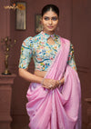A beautiful close-up of the model in a Vanya Sarees saree, highlighting the unique high-neck keyhole cut and floral print of the designer blouse.