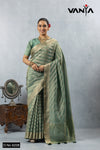 A full-length view of the model in Vanya Sarees' elegant sage green Leheriya weave Banarasi silk saree.