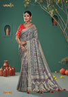 A full-length front view of the model in Vanya Sarees' magnificent grey Banarasi silk saree with a Patola-inspired weave.