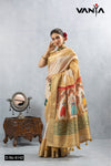 A full-length view of the model in Vanya Sarees' artistic off-white silk saree with a vibrant Kathputli (puppet) print pallu.