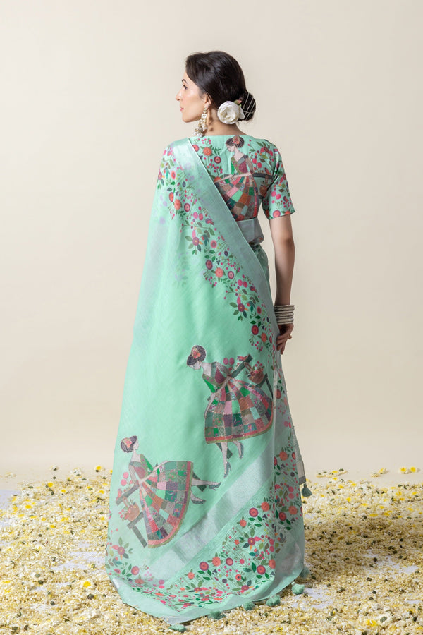 A full back view of the model in the Vanya Sarees ensemble, displaying the full artistic print on the pallu and designer blouse.