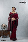 Vanya full-length front view of the Maroon Saree (7219) with heavy silver brocade pallu and sunglasses styling.