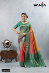 A full-length view of the model in Vanya Sarees' vibrant multi-color Bandhani print saree with a green Banarasi border.