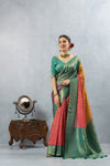 A joyful, smiling pose of the model in the Vanya Sarees multi-color Bandhani saree, perfect for a festive occasion like Navratri or a wedding.