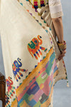 A close-up detail shot of the colorful, folk-art inspired elephant print on the pallu of the Vanya Sarees cotton silk saree.