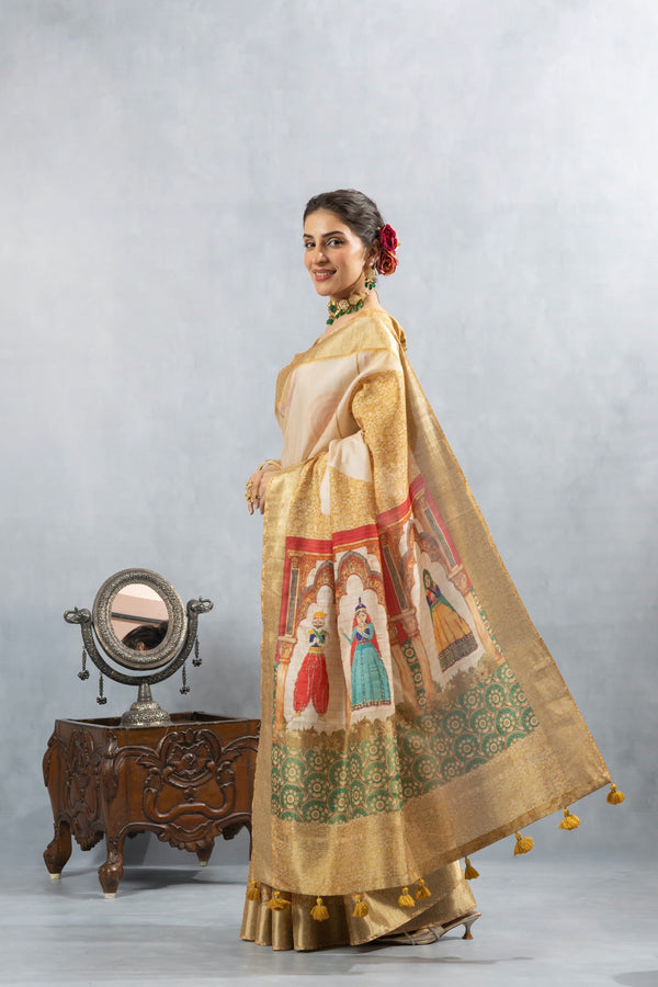 An elegant side profile of the model in the Vanya Sarees off-white silk saree, showcasing the full grandeur of the puppet-print pallu.