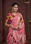 A beautiful close-up of the model in a Vanya Sarees saree, highlighting the unique Patola print and hand-embellished Peter Pan collar of the designer blouse.