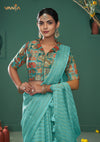 A clear front view of the Vanya Sarees readymade designer blouse, showcasing the unique shirt collar and rich multi-color Patola-style print.