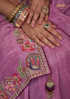 A detailed close-up of the pallu of the Vanya Sarees saree, showing the intricate multi-color peacock embroidery with sequin and zari work.