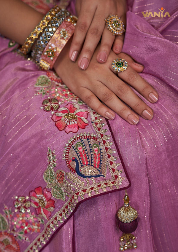 A detailed close-up of the pallu of the Vanya Sarees saree, showing the intricate multi-color peacock embroidery with sequin and zari work.