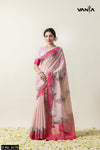 A full view of the model in Vanya Sarees' charming pink linen cotton saree with a whimsical bird and floral print.