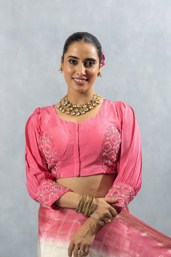 A clear front view of the Vanya Sarees readymade designer blouse, showing the pink bishop sleeves and sequin embellished panels.