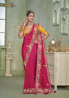 An graceful standing pose of the model showcasing the complete bridal look of the Vanya Sarees pink heavy embroidered saree.