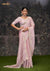 An graceful standing pose of the model showcasing the complete designer look of the Vanya Sarees pink heavy embroidered saree.